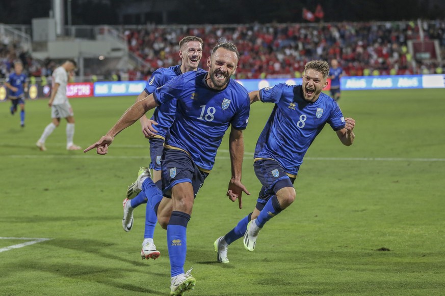 Kosovo&#039;s Vedat Muriqi celebrates after scoring his side second goal during the Euro 2024 group I qualifying soccer match between Kosovo and Switzerland at the Fadil Vokrri stadium in Pristina, Ko ...