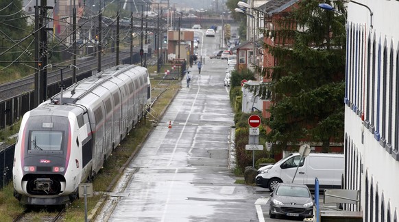 A new French high-speed train TGV is seen in front of the main plant of the French engineering giant Alstom in Belfort, France, September 16, 2016. REUTERS/Jacky Naegelen