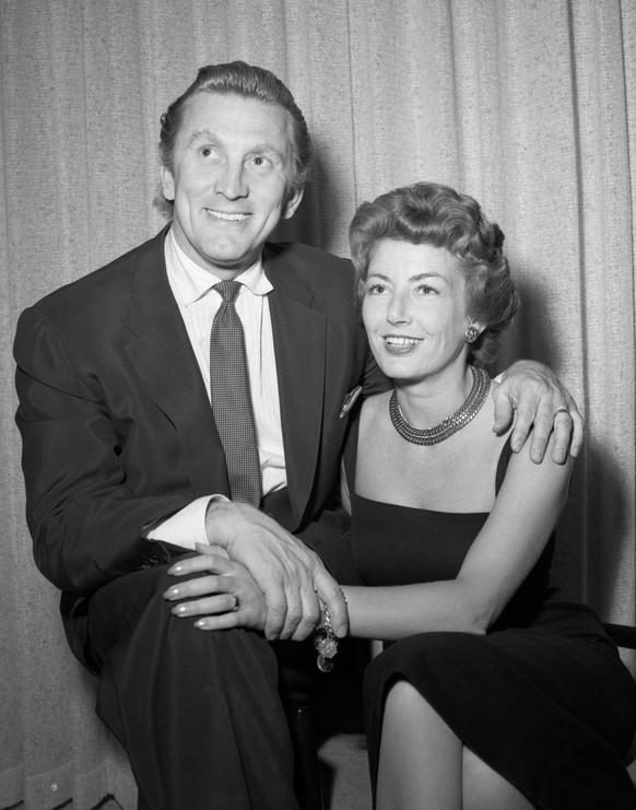 epa08196617 A handout photo made available by the Las Vegas News Bureau on 05 February 2020 shows US actor Kirk Douglas (L) and his wife Anne Buydens (R) posing for wedding photos at the Sahara Hotel  ...