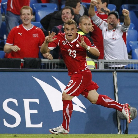 Switzerland&#039;s Xherdan Shaqiri celebrates after scoring the 3-1 during the Euro 2012 group G qualification soccer match between Switzerland and Bulgaria at the St. Jakob-Park Stadium in Basel, Swi ...