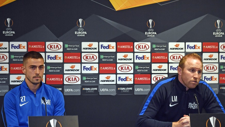 Zuerich&#039;s coach Ludovic Magnin, left, and player Marco Schoenbaechler, left, attends a press conference in Zurich, Switzerland, February 13, 2019. FC Zuerich will play Napoli on 14 February in th ...