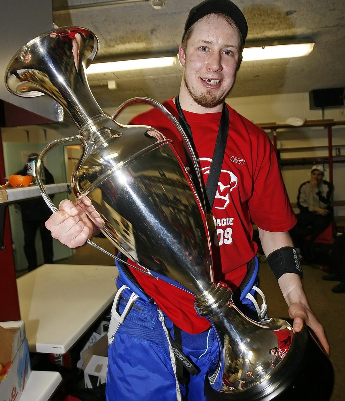 ZSC Lions defensman Mathias Seger poses with the 'Silver Stone' trophy in the locker room after ZSC's victory in the ice hockey Champions League second leg final game between ZSC Lions  ...