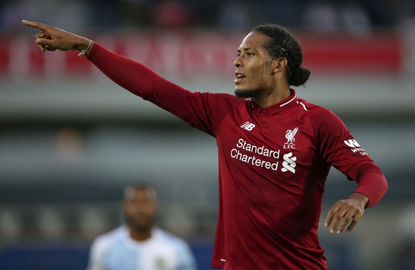 Liverpool&#039;s Virgil van Dijk reacts during a pre season friendly soccer match against Blackburn, at Ewood Park in Blackburn, England, Thursday July 19, 2018. (Nigel French/PA via AP)