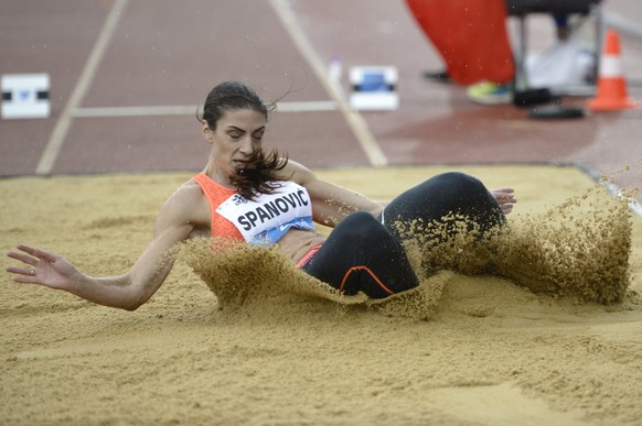 Ivana Spanovic from Serbia competes in the women&#039;s long jump event during the IAAF Diamond League athletics meeting in the Letzigrund stadium in Zurich, Switzerland, Thursday, Sept.3, 2015. (Jean ...