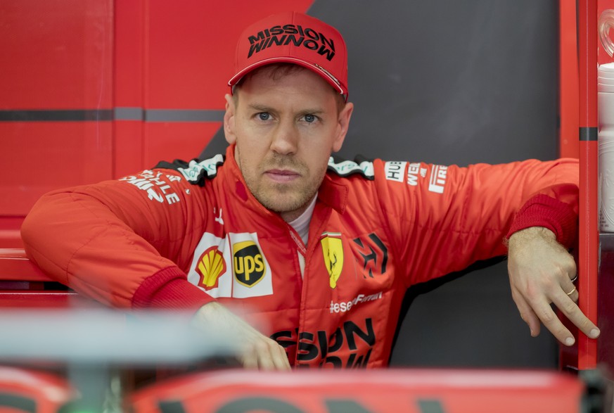 Scuderia Ferrari Mission Winnow&#039;s Sebastian Vettel stands at his box during the Formula One pre-season testing session at the Barcelona Catalunya racetrack in Montmelo, outside Barcelona, Spain,  ...