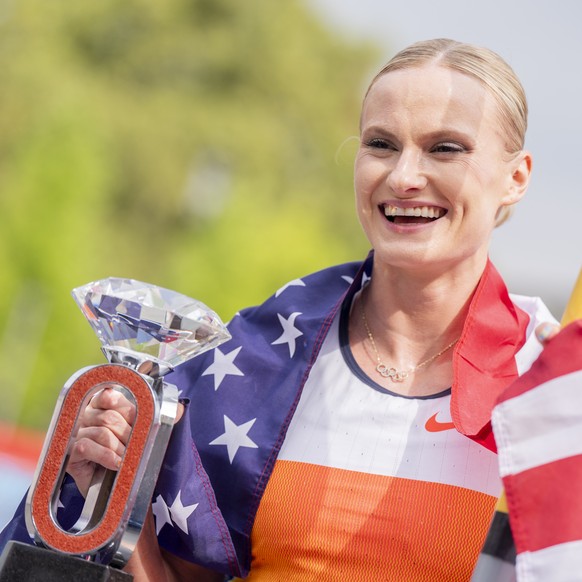 Winner Katie Moon of United States reacts during the city event of the World Athletics Diamond League final 2025 Weltklasse Zurich athletics meeting at the Sechselaeutenplatz in front of the Opera hou ...