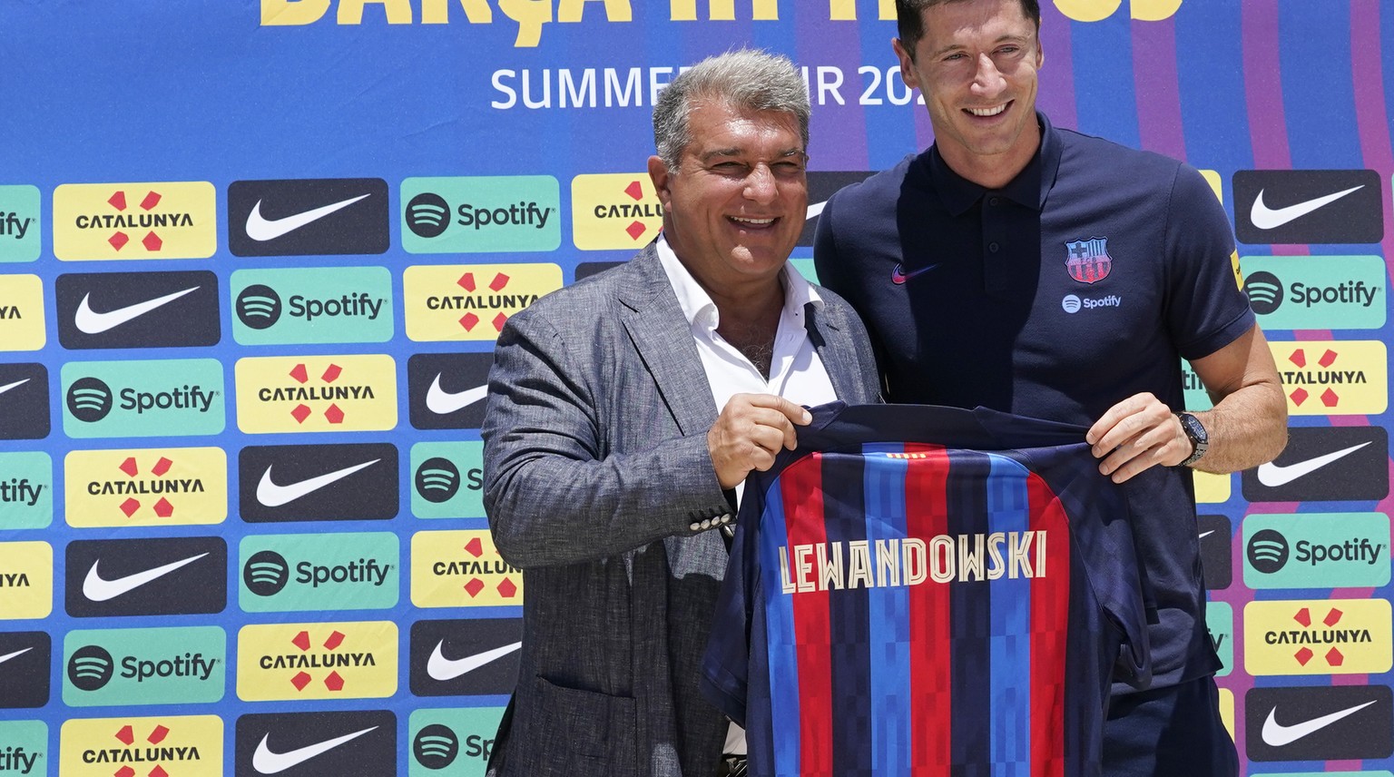 FC Barcelona soccer team President Joan Laporta, left, introduces new striker Robert Lewandowski, Wednesday, July 20, 2022, in Fort Lauderdale, Fla. (AP Photo/Marta Lavandier)
Joan Laporta,Robert Lewa ...