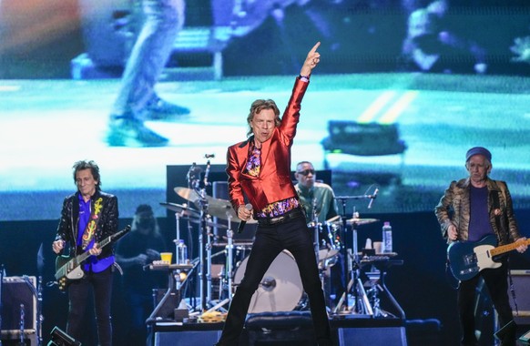 Mick Jagger, centre, Ronnie Wood, left, and Keith Richards, right, of the band the Rolling Stones, perform during their Sixty Stones Europe 2022 tour at the Wanda Metropolitano stadium in Madrid, Spai ...