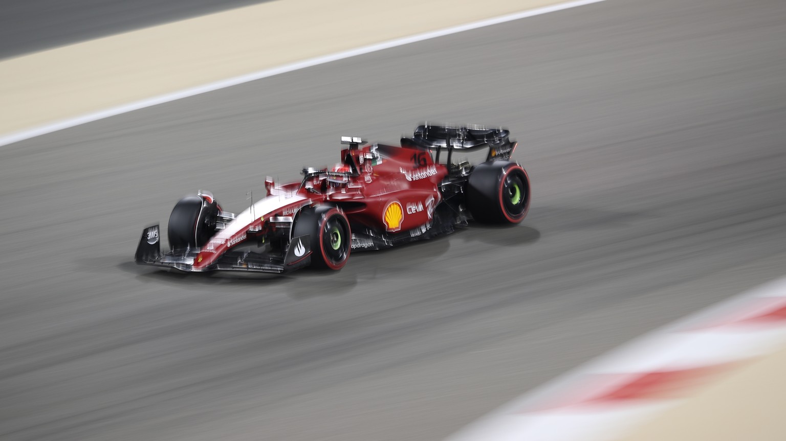 epa09836359 Monaco&#039;s Formula One driver Charles Leclerc of Scuderia Ferrari Mission Winnow steers his car during the qualifying for the 2022 Formula One Grand Prix of Bahrain at the Sakhir circui ...