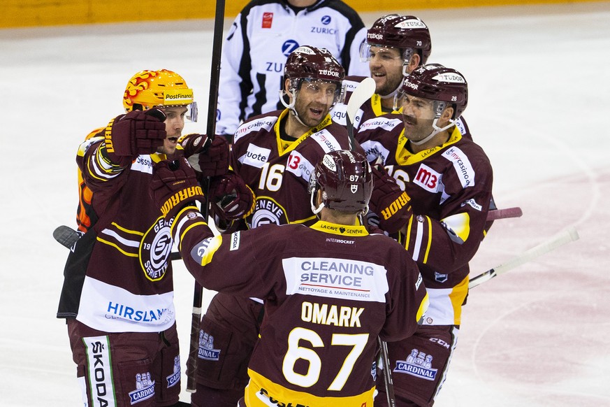 Geneve-Servette&#039;s defender Henrik Toemmernes, of Sweden, left, celebrates his goal with teammates center Eric Fehr #16, of Canada, forward Linus Omark #67, of Sweden, forward Arnaud Montandon #70 ...