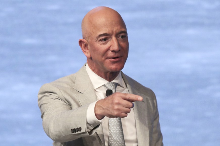 FILE - In this June 19, 2019, file photo, Amazon founder Jeff Bezos speaks during the JFK Space Summit at the John F. Kennedy Presidential Library in Boston. Bezos is one of the 50 Americans who gave  ...