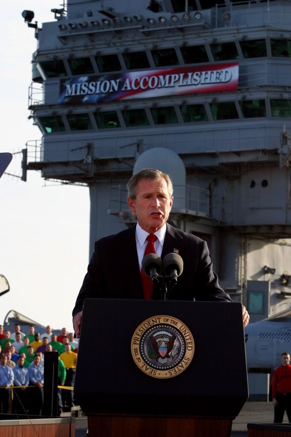 In this May 1, 2003, file photo, President Bush declares the end of major combat in Iraq as he speaks aboard the aircraft carrier USS Abraham Lincoln off the California coast. The White House said Apr ...