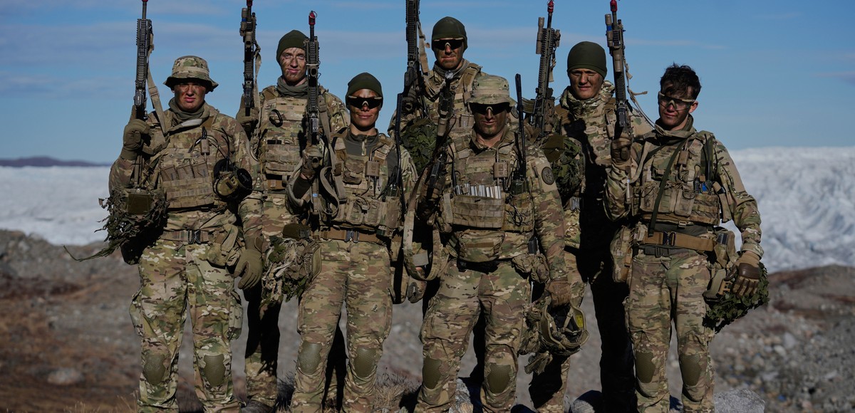 Danish military forces pose for a photo during an exercise with hundreds of troops from several European NATO members in Kangerlussuaq, Greenland, Wednesday, Sept. 17, 2025. (AP Photo/Ebrahim Noroozi) ...