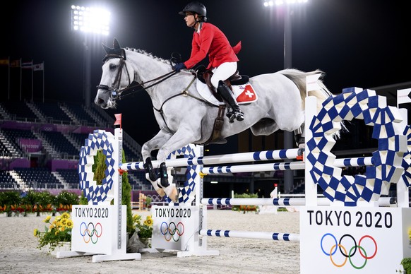 Melody Johner of Switzerland riding Toubleu de Rueire competes in the equestrian eventing individual jumping final at the 2020 Tokyo Summer Olympics in Tokyo, Japan, on Monday, August 02, 2021. (KEYST ...