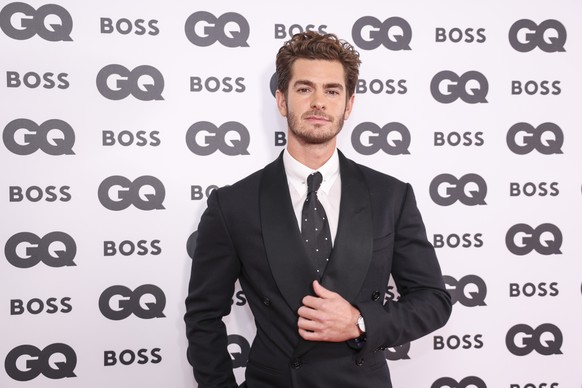 Andrew Garfield poses for photographers as they arrive at the GQ Men of the Year 2022 event in London, Wednesday, November 16, 2022. (Photo by Vianney Le Caer/Invision/AP) Andrew Garfield