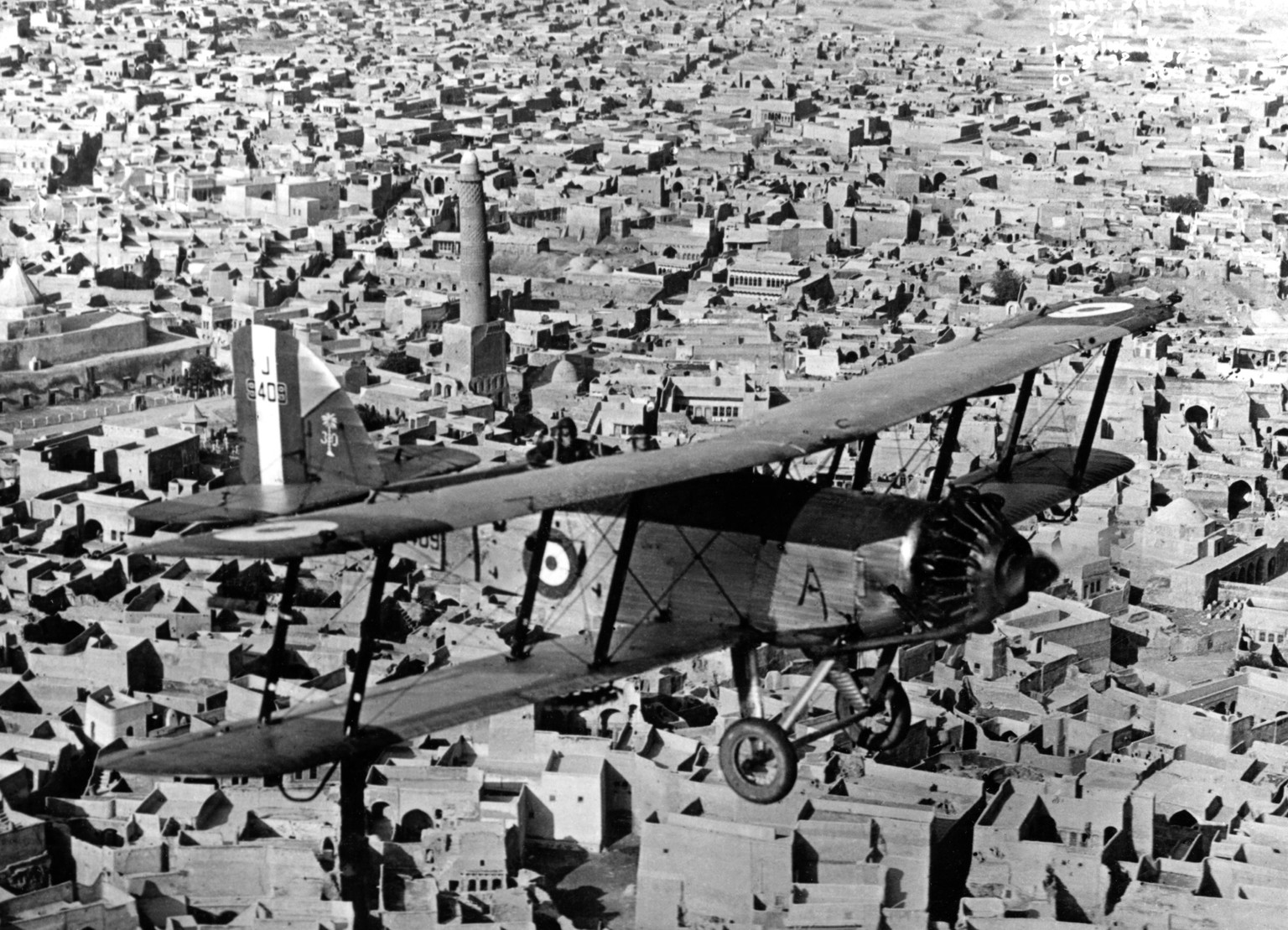 FILE - In this photo issued Sunday April 1, 2018, by Britain's Ministry of Defence photo dated March 11, 1932 of an RAF Westland Wapiti IIa of 30 Squadron in flight over the city of Mosul in Iraq, as ...
