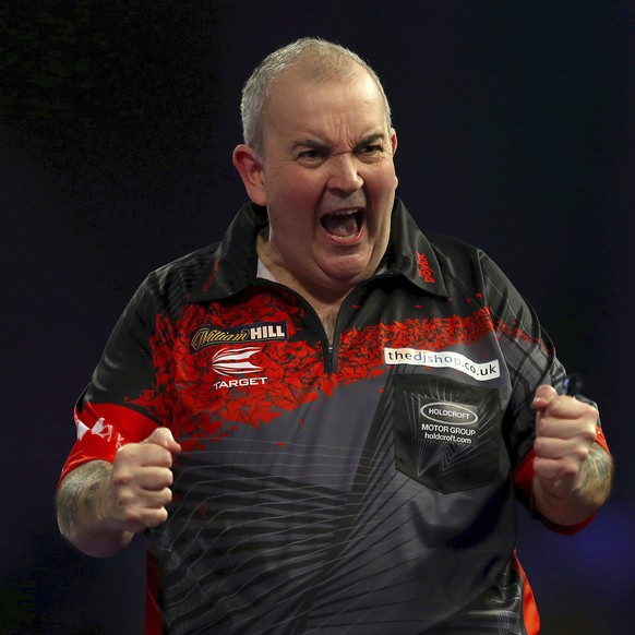 England&#039;s Phil Taylor after winning against his opponent Wales&#039; Jamie Lewis, in the semifinals of the World Darts Championship at Alexandra Palace, London, Saturday Dec. 30, 2017. (Steven Pa ...