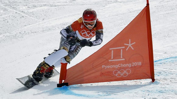 Ester Ledecka, of the Czech Republic, runs the course during the women&#039;s parallel giant slalom elimination run at Phoenix Snow Park at the 2018 Winter Olympics in Pyeongchang, South Korea, Saturd ...