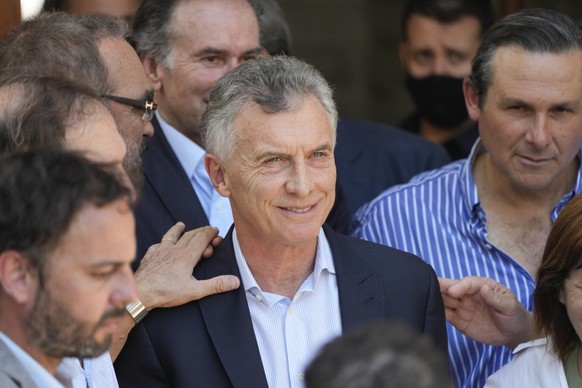 Former Argentine President Mauricio Macri leaves court where he was summoned to give a statement in Dolores, Argentina, Thursday, Oct. 28, 2021. Macri was summoned as a suspect in the case of alleged  ...