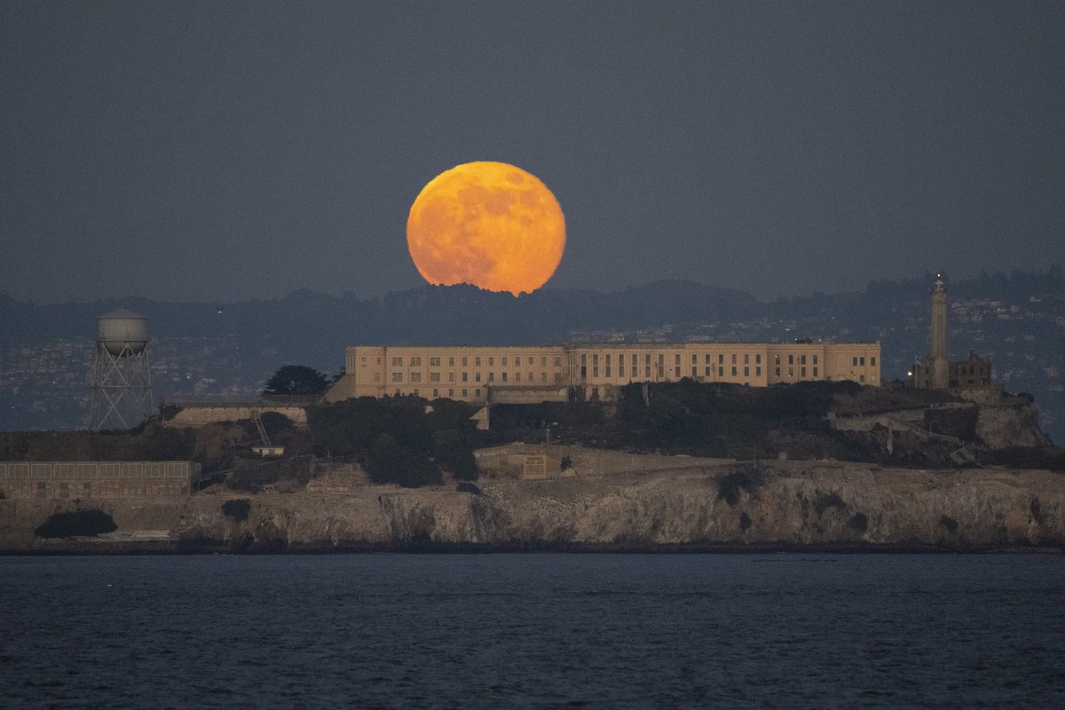 A full moon, also known as the Beaver Moon, rises above Alcatraz Island in San Francisco, Monday, Nov. 27, 2023. The Beaver Moon is the last full moon before the winter solstice. (AP Photo/Eric Risber ...