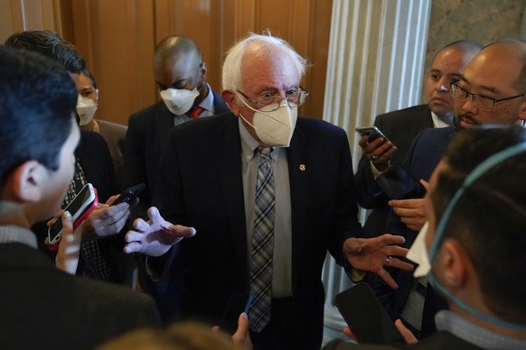 FILE - Sen. Bernie Sanders, I-Vt., speaks with reporters on Capitol Hill in Washington, Saturday, Aug. 6, 2022. Democrats pushed their election-year economic package to Senate passage Sunday, Aug. 7,  ...