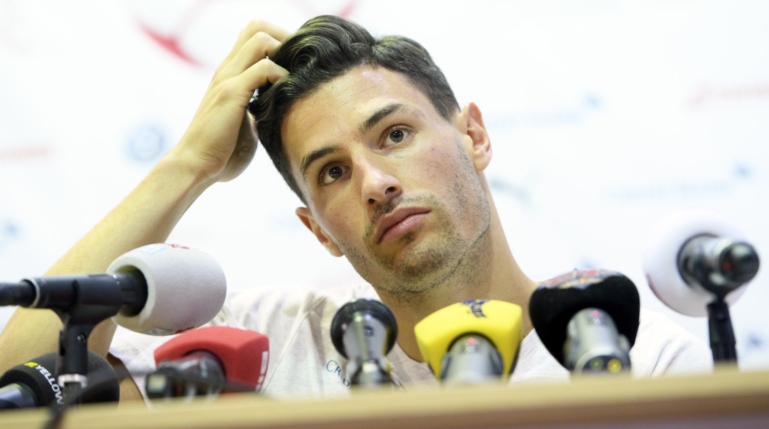 Switzerland&#039;s defender Fabian Schaer speaks during a press conference after a training session of the Switzerland&#039;s national soccer team at the Torpedo Stadium, in Togliatti, Russia, Tuesday ...