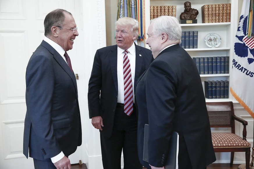 epa05955486 A handout photo made available by the Russian Foreign Ministry shows US President Donald J. Trump (C) speaking with Russian Foreign Minister Sergei Lavrov (L) and Russian Ambassador to the ...