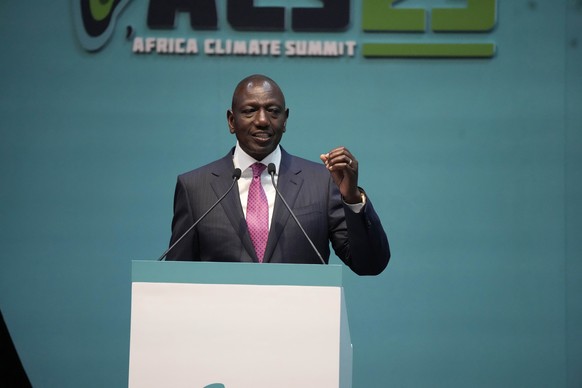 Kenyan President William Ruto, addresses delegates during the official opening of the Africa Climate Summit at the Kenyatta International Convention Centre in Nairobi, Kenya, Monday, Sept. 4, 2023. Th ...