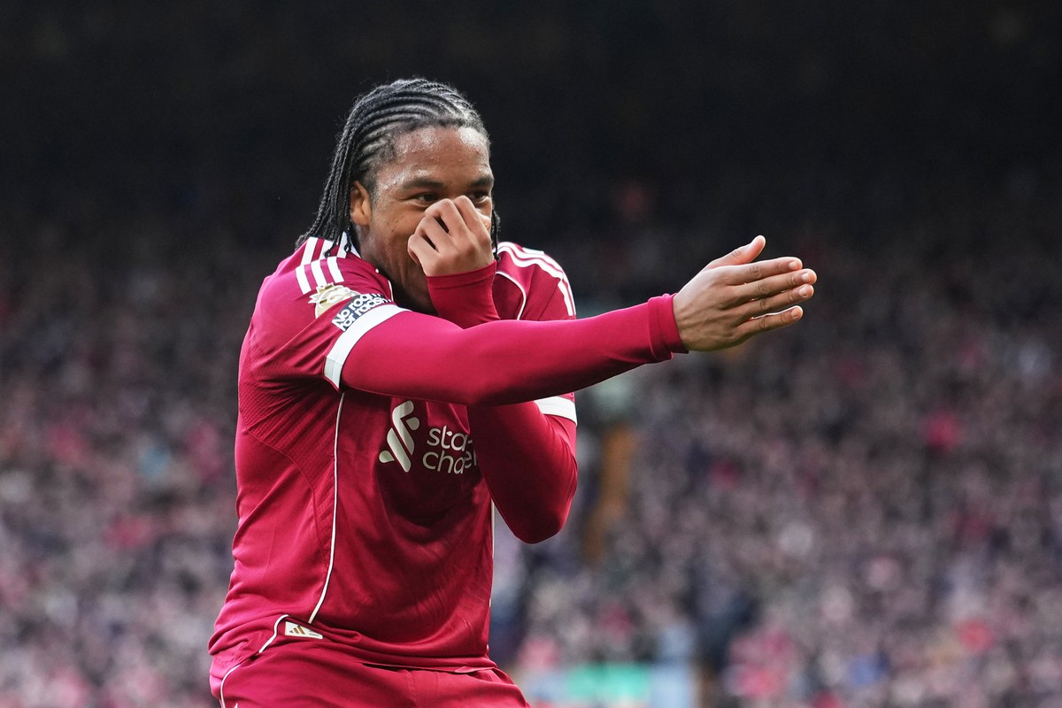 Liverpool's Rio Ngumoha celebrates after scoring his side's opening goal during the English Premier League soccer match between Liverpool and Fulham in Liverpool, England, Saturday, April 11 ...