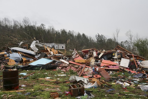 Piles of debris remain after a tornado touched down killing several people and damaging multiple homes Thursday, March 25, 2021 in Ohatchee, Ala. (AP Photo/Butch Dill)