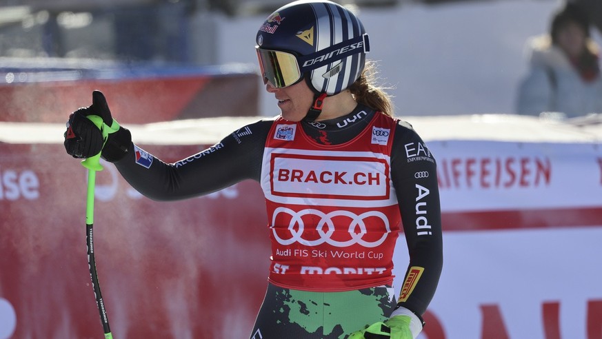 Italy&#039;s Sofia Goggia reacts after crossing the finish line to complete an alpine ski, women&#039;s World Cup downhill race, in St. Moritz, Switzerland, Saturday, Dec. 17, 2022. (AP Photo/Marco Tr ...