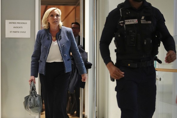 KEYPIX - French far-right leader Marine Le Pen leaves the courtroom after a French court found Marine Le Pen guilty on in an embezzlement case but didn&#039;t immediately say what her sentence might b ...
