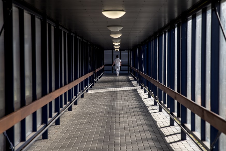 epa08062311 Medical staff walk at a corridor of a hospital in Benesov, Czech Republic, 11 December 2019. According to local media reports, a computer virus has paralyzed operations of a hospital in Be ...