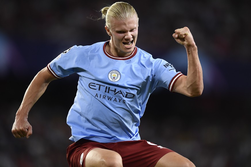 Manchester City&#039;s Erling Haaland celebrates after scoring his side&#039;s third goal during the group G Champions League soccer match between Sevilla and Manchester City in Seville, Spain, Tuesda ...