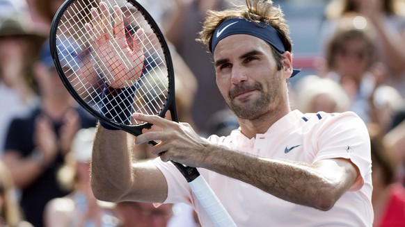 Roger Federer, of Switzerland, celebrates his victory over Roberto Bautista Agut, of Spain, during quarterfinal play at the Rogers Cup tennis tournament, Friday Aug. 11, 2017, in Montreal. (Paul Chias ...