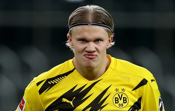 epa08958999 Erling Haaland of Dortmund reacts during the German Bundesliga soccer match between Borussia Moenchengladbach and Borussia Dortmund at Borussia-Park in Moenchengladbach, Germany, 22 Januar ...