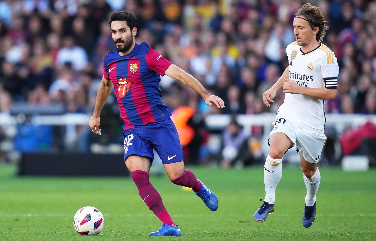 ESP: FC Barcelona, Barca Real Madrid CF. La Liga EA Sports match. Date 11 Ilkay Gundogan of FC Barcelona and Luka Modric of Real Madrid during the La Liga EA Sports match between FC Barcelona and Real ...