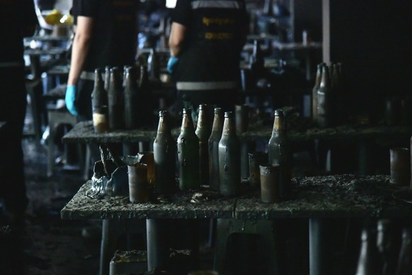 KEYPIX - In this handout photo released by Bangkok Metropolitan Administration, bottles are seen on a table at the site of a fire in Bangkok, Thailand, Monday, July 13, 2026. (KEYSTONE/Bangkok Metropo ...