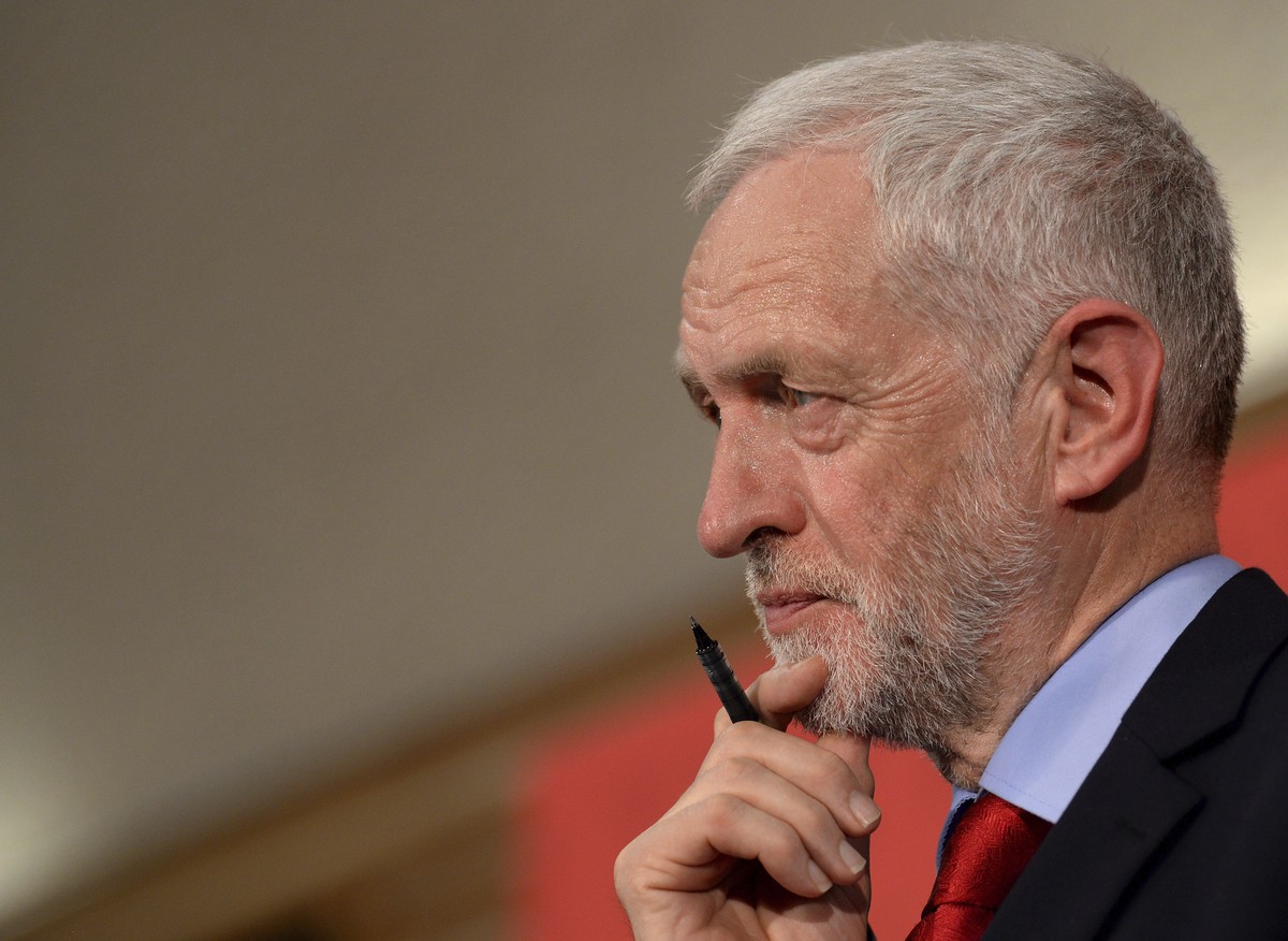 FILE - In this Thursday June 1, 2017 file photo, Britain's Labour Party leader Jeremy Corbyn, looks on during a speech on Brexit while on the General Election campaign trail in Basildon, England. ...