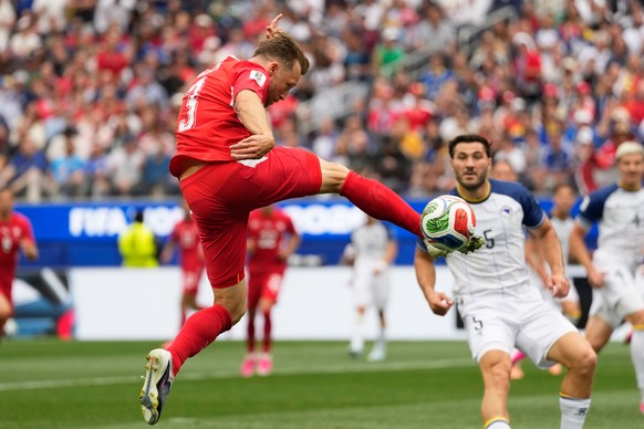Switzerland's Silvan Widmer attempts a shot on goal during the World Cup Group B soccer match between Switzerland and Bosnia in Inglewood, Calif., near Los Angeles, Thursday, June 18, 2026. (AP P ...