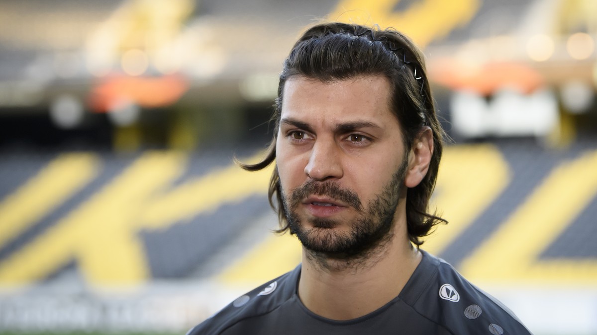 Leverkusen's Aleksandar Dragovic speaks with Journalists before a press conference one day prior to the round of 32, 1st leg UEFA Europa League match between Switzerland's BSC Young Boys and ...