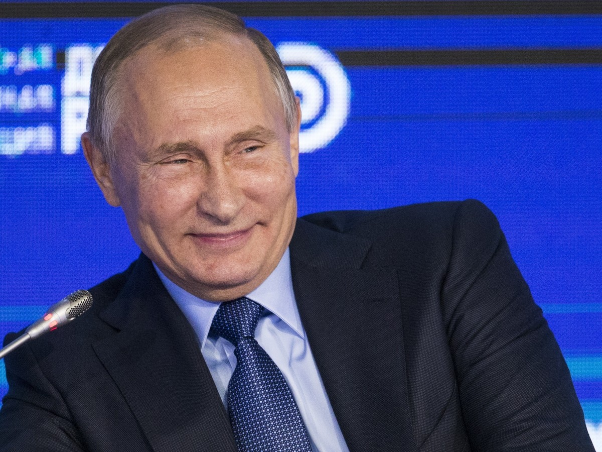 Russian President Vladimir Putin smiles as he attends the Business Russia Congress in Moscow, Russia, Tuesday, Oct. 18, 2016. Putin said that Russia would offer more freedom to private business to hel ...
