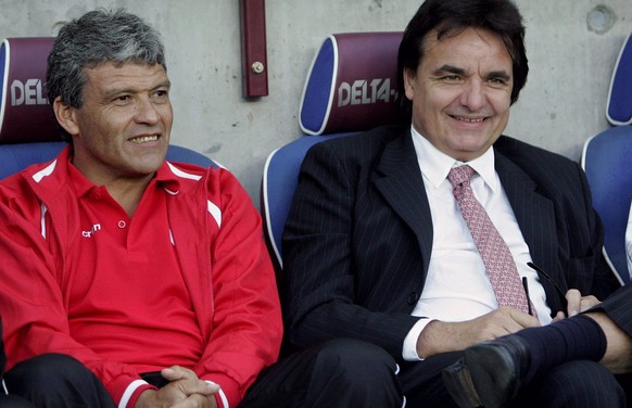 Nestor Clausen, left, coach of Swiss club Sion, and Christian Constantin, right, president of Swiss club Sion, smile prior the UEFA Cup second round, second leg match between FC Sion, of Switzerland a ...