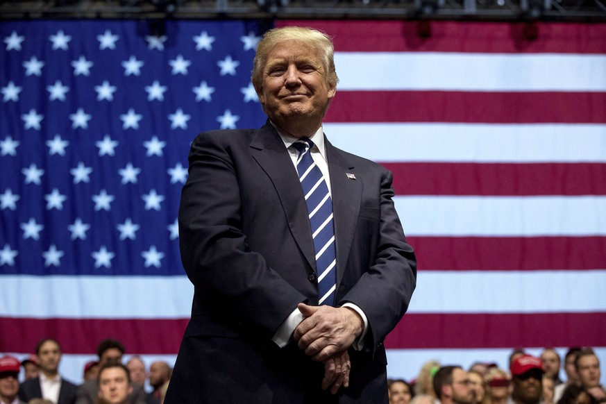 In this Dec. 9, 2016, photo, President-elect Donald Trump smiles during a rally at DeltaPlex Arena in Grand Rapids, Mich. Trump sounds ready to use U.S. policy toward Taiwan as a bargaining chip to ex ...