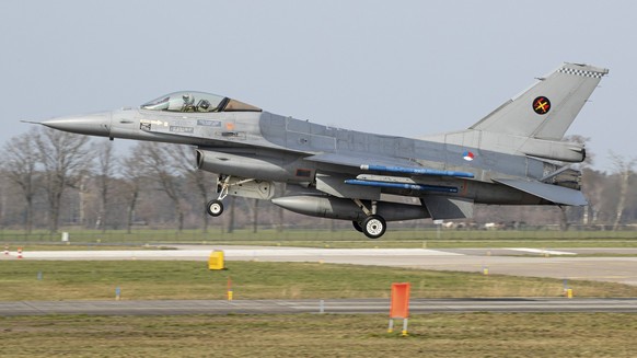 A Royal Netherlands Air Force F-16 Fighting Falcon fighter jet landing at its homebase in Volkel, Netherlands. model released Copyright: DirkxJanxdexRidder/StocktrekxImages DJR100039M