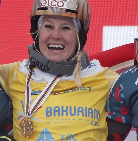 epa10481872 (from L) Silver medal winner Ladina Jenny of Switzerland, gold medal winner Julie Zogg of Switzerland and bronze medal winner Sabine Schoeffmannof Austria pose during the award ceremony of ...