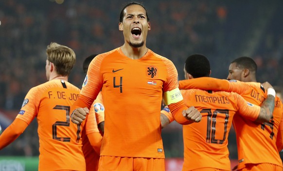 epa07454411 (L-R) Frenkie de Jong of Holland, Virgil van Dijk of Holland, Memphis Depay of Holland, Georginio Wijnaldum of Holland during the UEFA EURO 2020 qualifier group C qualifying match between  ...