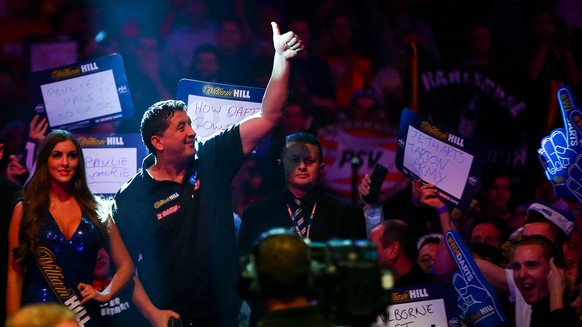 LONDON, ENGLAND - DECEMBER 29: Mensur Suljovic of Austria walks on ahead of his third round match against Adrian Lewis of England on Day Eleven of the 2016 William Hill PDC World Darts Championships a ...