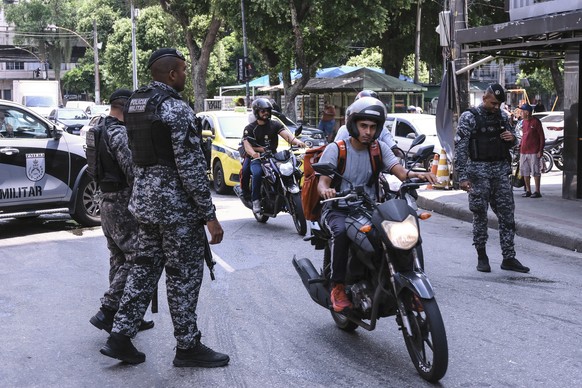 epa12830492 Members of the Military Police carry out an operation in the Rio Comprido neighborhood, in Rio de Janeiro, Brazil, 18 March 2026. At least eight people died during a police operation again ...