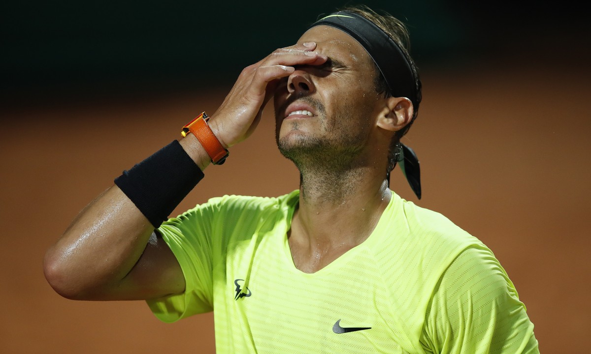 epa08682697 Rafael Nadal of Spain reacts during his men's singles quarter-finals round match against Diego Schwartzman of Argentina at the Italian Open tennis tournament in Rome, Italy, 19 Septem ...